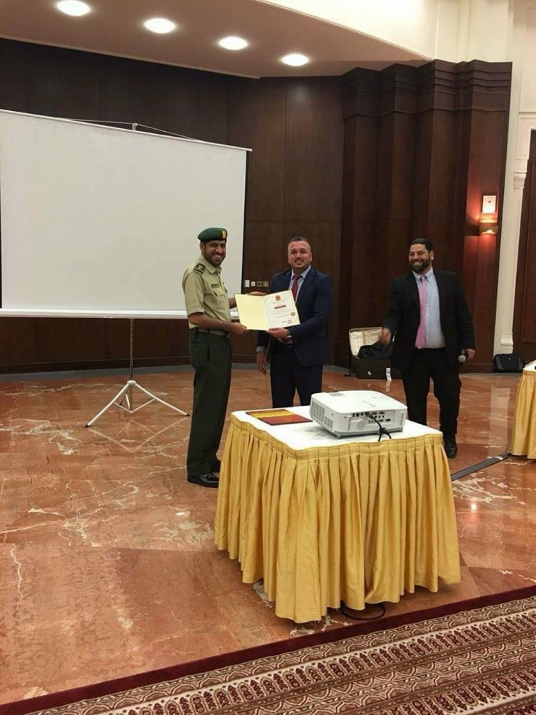 Certificate presentation with UAE Ministry of Defence officer